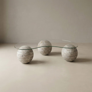 Efesus Stone Couchtisch mit transparenter Tischplatte und drei Kugelsockeln
